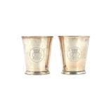 A pair of Victorian silver beakers, each of tapering cylindrical form,
