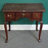 A George II oak low boy, with three frieze drawers on square cabriole supports,