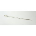 A George III silver skewer, with a ring shaped terminal, London 1808, length 32cm, weight 107 gms.