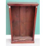 A 19th century mahogany floor standing open bookcase over plinth base,