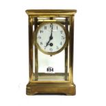 A French brass cased four glass mantel clock, early 20th century,