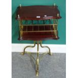 A late 19th century French mahogany and brass two tier magazine stand, on tripod base,