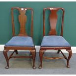A set of eight mid-18th century mahogany vase back dining chairs, on club supports,