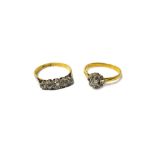 A gold and platinum, diamond set five stone ring,