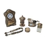 Silver and silver mounted wares, comprising; a small clock, Birmingham 1909,