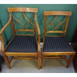 A set of twenty Regency style mahogany framed dining chairs with double 'X' frame splat and