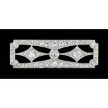 A diamond brooch, pierced in a shaped rectangular Art Deco design,