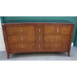 A 20th century concave fronted sideboard,