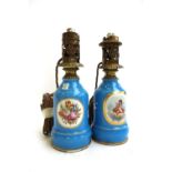 A pair of porcelain oil lamp bases (converted),