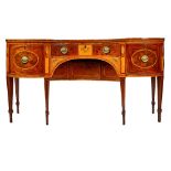A George III inlaid mahogany inverted bowfront sideboard, with four frieze drawers,