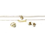 A 9ct gold and cultured pearl pendant with a bow surmount, on a 9ct gold neckchain,