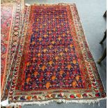A Fereghan rug, Persian, the indigo field with an all over vine design with single boteh flowers,