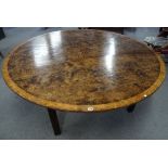 An 18th century style pollard oak centre table, the circular top with star burst inlay,
