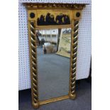A 19th century gilt framed pier glass, with inverted ball mounted frieze and classical panel,