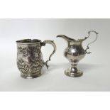 Silver, comprising; a George III cream jug, of baluster form, with a scrolling handle,
