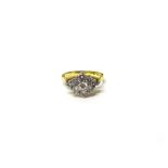 An 18ct gold and diamond nine stone cluster ring, in a marquise shaped design,