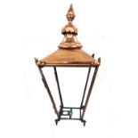 A Victorian copper plain lantern (lacking glass), of square tapering form (a.f), 90cm high.