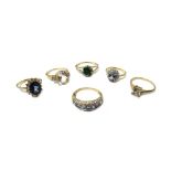 Six 9ct gold and vary coloured gem set dress rings, in a variety of designs,