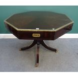A campaign style brass bound mahogany octagonal drum table,