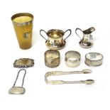 Silver and silver mounted wares, comprising; a twin handled sugar bowl and a matching milk jug,