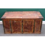 A late 19th century North European metal bound painted pine marriage chest,