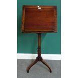 A 19th century inlaid mahogany reading stand, the height adjustable top on tripod base, 51cm wide.