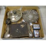 Silver and silver mounted wares, comprising; a shaped rectangular photograph frame front,