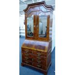 An 18th century German figured walnut bureau cabinet,