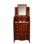 An early 19th century inlaid mahogany cylinder fronted washstand,