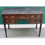 A late 19th century mahogany writing desk, with five drawers about the knee,