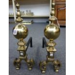 A pair of Dutch style brass andirons, 19th century and later, of turned bulbous form,