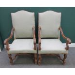 A pair of 17th century Italian style walnut framed open armchairs,