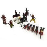 A quantity of Britains hollow cast lead military figures, mainly pre-war,