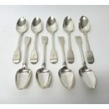 Nine Fiddle pattern table spoons, comprising; three London 1802,