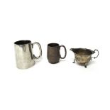 Silver, comprising; a christening mug, of tapering cylindrical form, with a 'C' shaped handle,