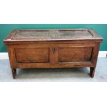 A 16th century oak five panel coffer, with raised frame moulding, on slab end supports,