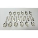 Silver table flatware, comprising; six Victorian Fiddle pattern dessert spoons,