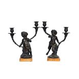 A pair of French bronze figural twin branch candelabra, 19th century,