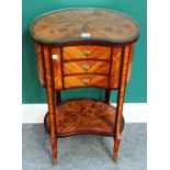 A Napoleon III marquetry inlaid kidney shaped three drawer side table, on shaped supports,