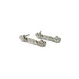 A pair of diamond set drop earrings,