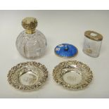 A pair of Sterling bonbon dishes, each with scroll pierced decoration within a floral moulded rim,