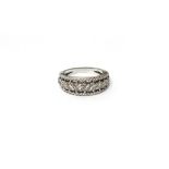 A diamond set eleven stone half hoop ring,