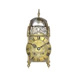 A brass lantern clock, late 19th century, of typical form,