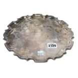 A silver salver, decorated with a pie-crust rim, presentation inscribed and dated 1995,
