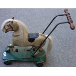 A child's Victorian style push-along wooden horse, late 20th century, dapple grey,