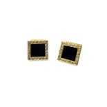 A pair of gold, black onyx and diamond set dress cufflinks,