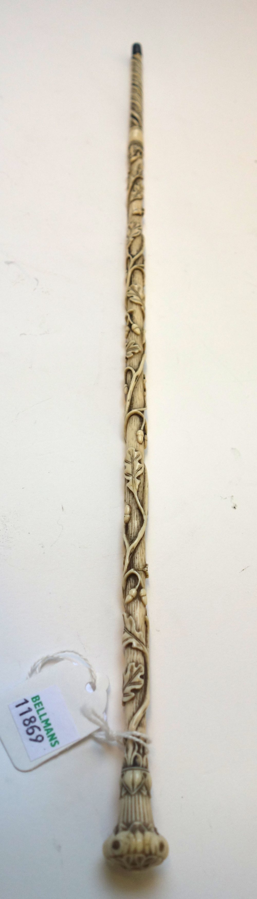 An ivory conductors baton, 19th century, intricately carved all over with vines, - Image 3 of 3