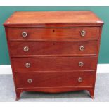 A George III mahogany chest of four long graduated drawers, on splayed bracket feet,