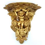 A giltwood carved figural wall bracket, 19th century,