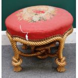 A Napoleon III footstool, with gilt ropetwist base, 55cm wide x 39cm high.